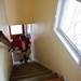 Ann Arbor Santa Claus Danny Maier climbs stairs to apply makeup and adjust his beard at his home on Sunday. Daniel Brenner I AnnArbor.com